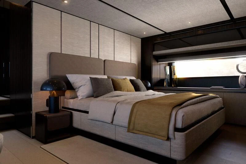 a bed in a room aboard REV Yacht for Sale
