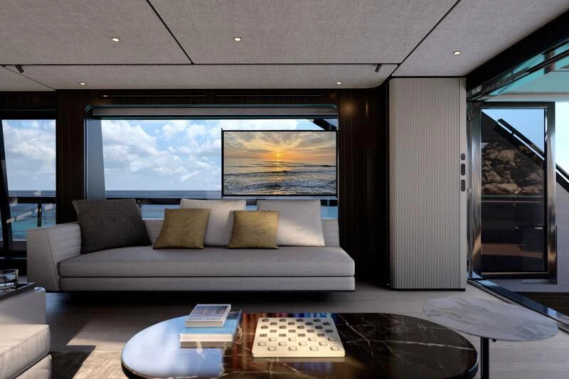 a living room with a large window aboard REV Yacht for Sale