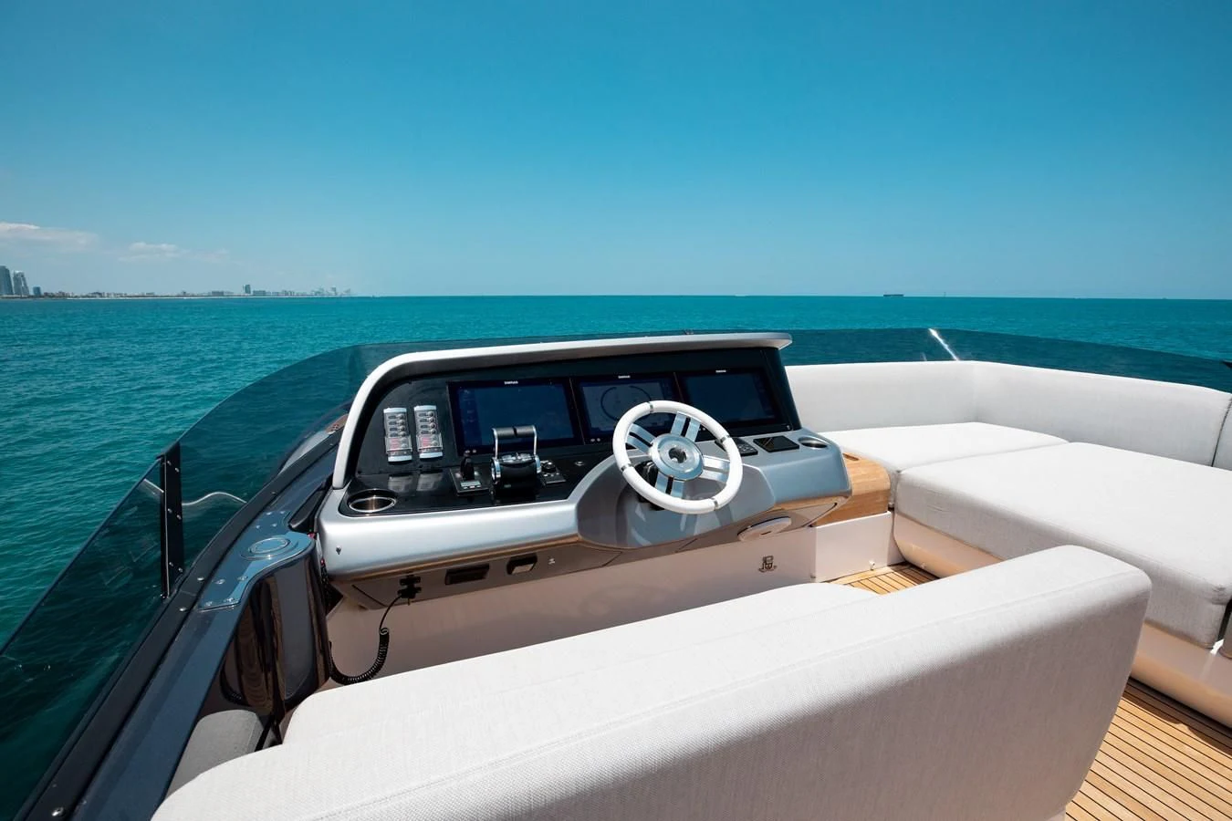 a car driving on a boat aboard BASH II Yacht for Sale