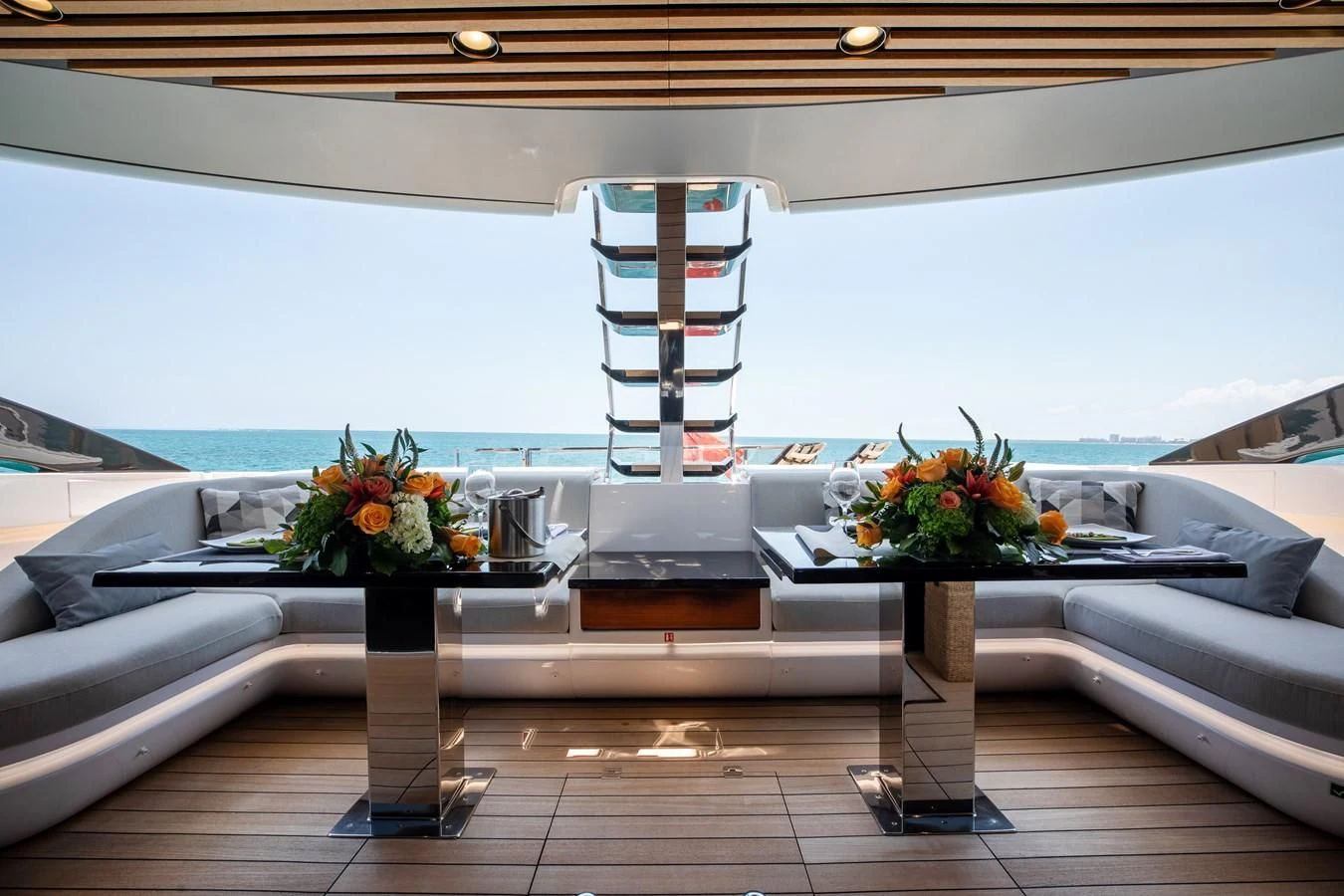 a table with flowers on it aboard BASH II Yacht for Sale