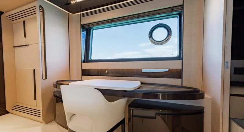 a room with a desk and a television aboard BASH II Yacht for Sale