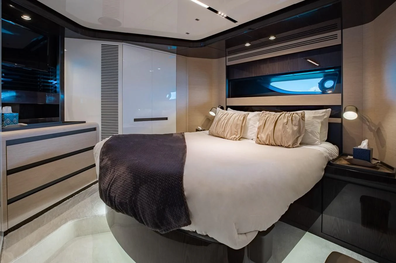 a bed in a room aboard BASH II Yacht for Sale