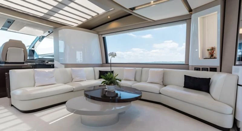 a living room with a large window aboard BASH II Yacht for Sale