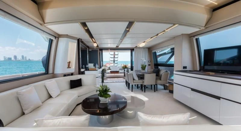 a living room with a large window aboard BASH II Yacht for Sale