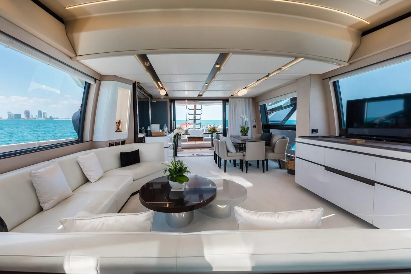 a living room with a large window aboard BASH II Yacht for Sale