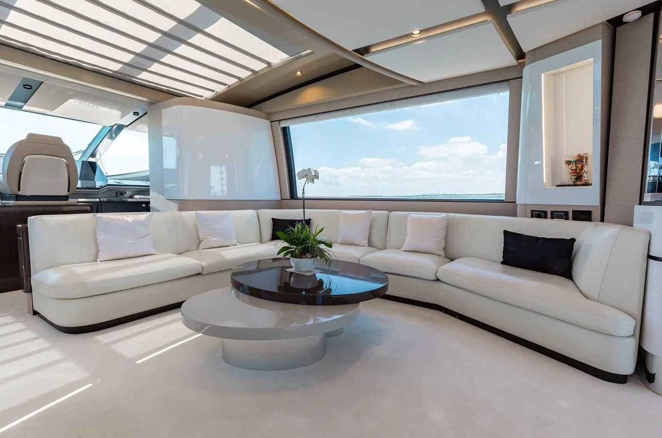 a living room with a large window aboard BASH II Yacht for Sale