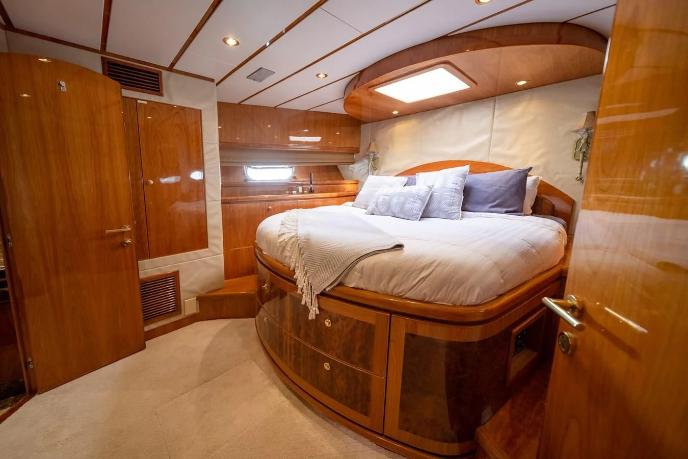 a bed in a room aboard HAPPY Yacht for Sale