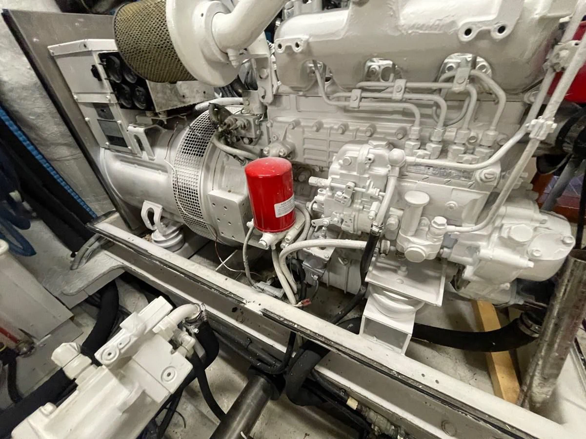 a close-up of a car engine aboard HAPPY Yacht for Sale