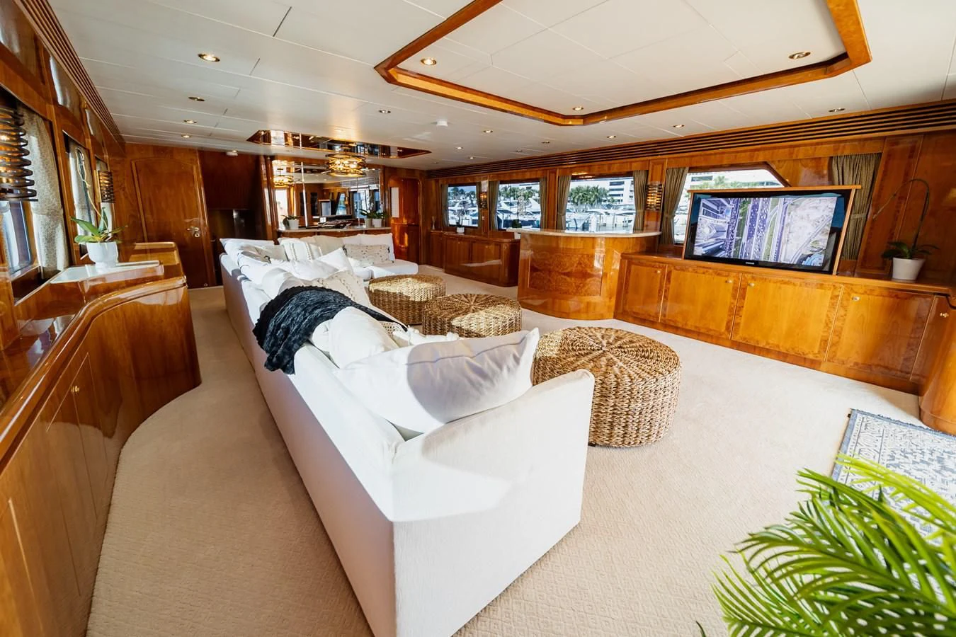 a large living room with a large window aboard HAPPY Yacht for Sale