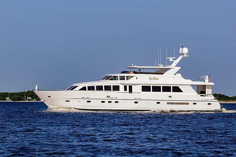 a white boat in the water aboard HAPPY Yacht for Sale