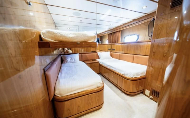 a room with bunk beds aboard HAPPY Yacht for Sale