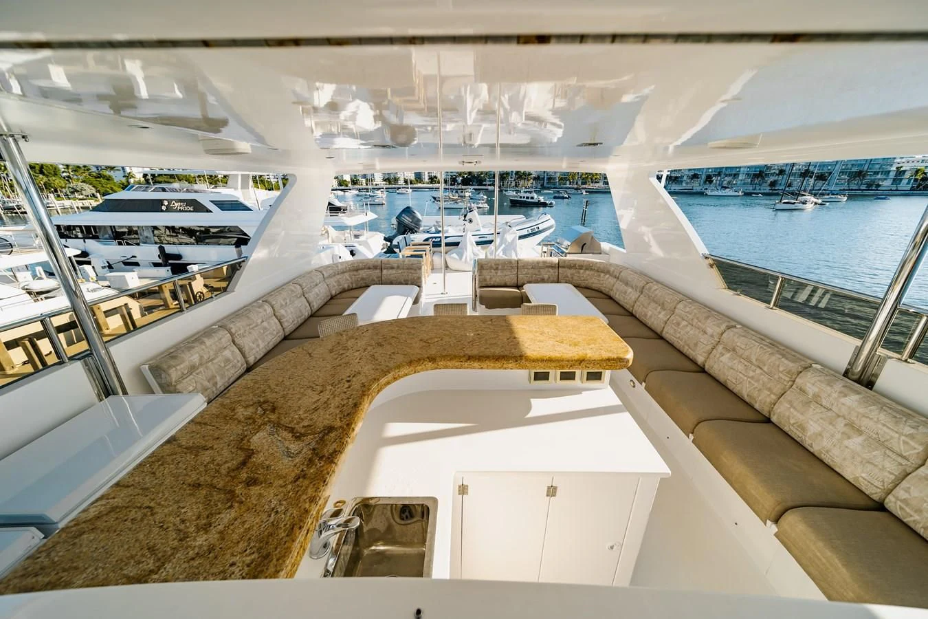 a view of a pool from the roof of a building aboard HAPPY Yacht for Sale