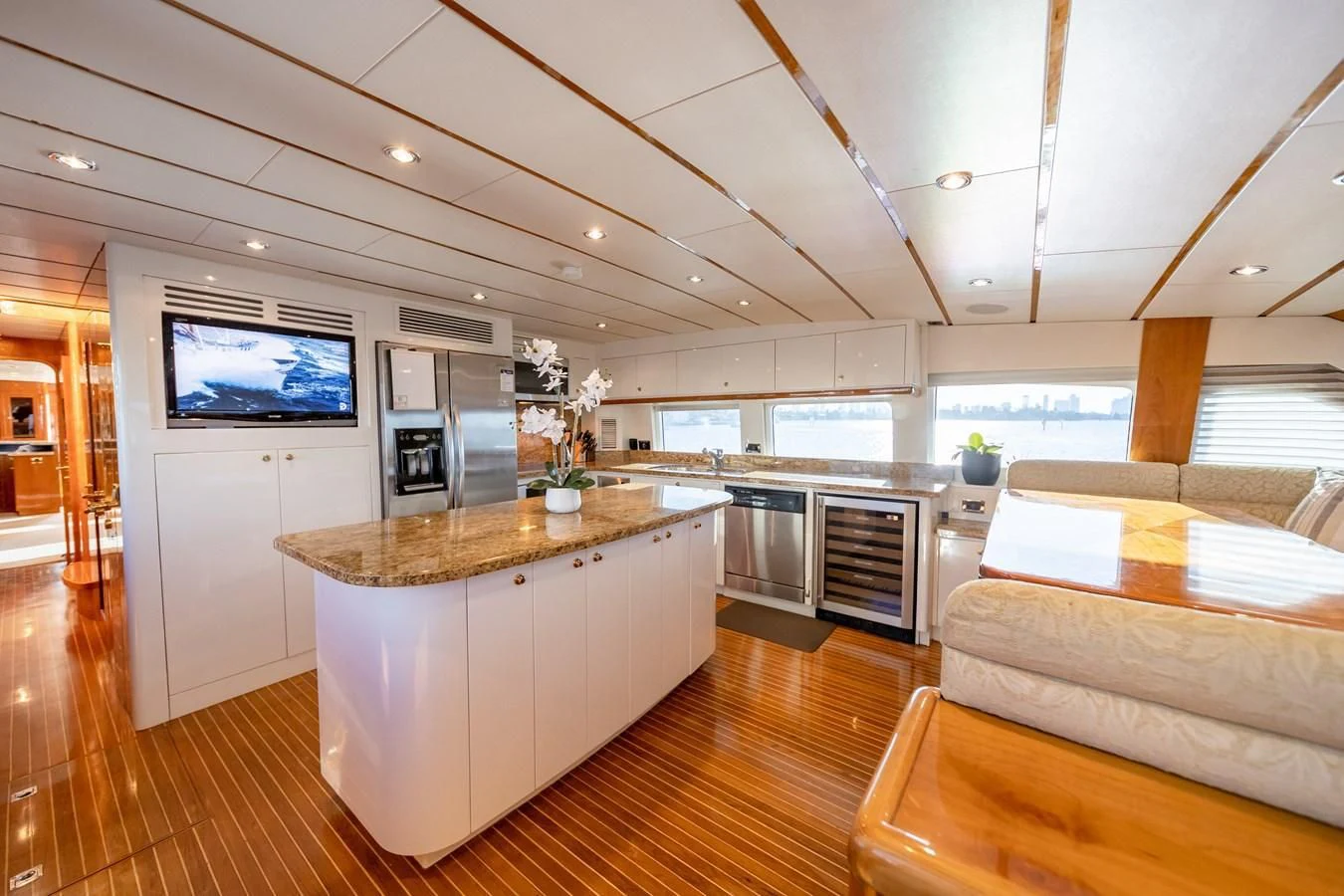 a kitchen with a large island aboard HAPPY Yacht for Sale
