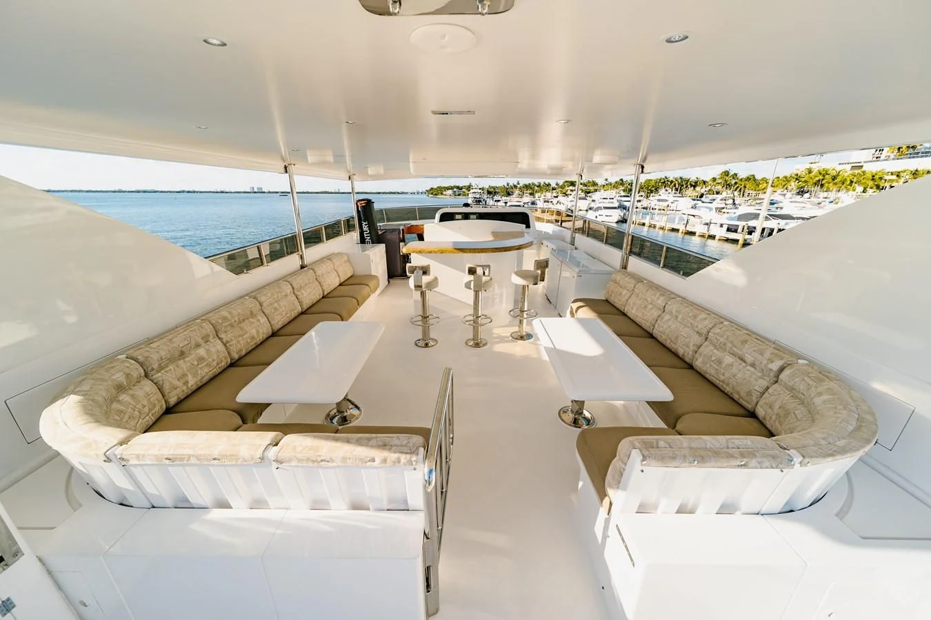 a room with a table and chairs aboard HAPPY Yacht for Sale