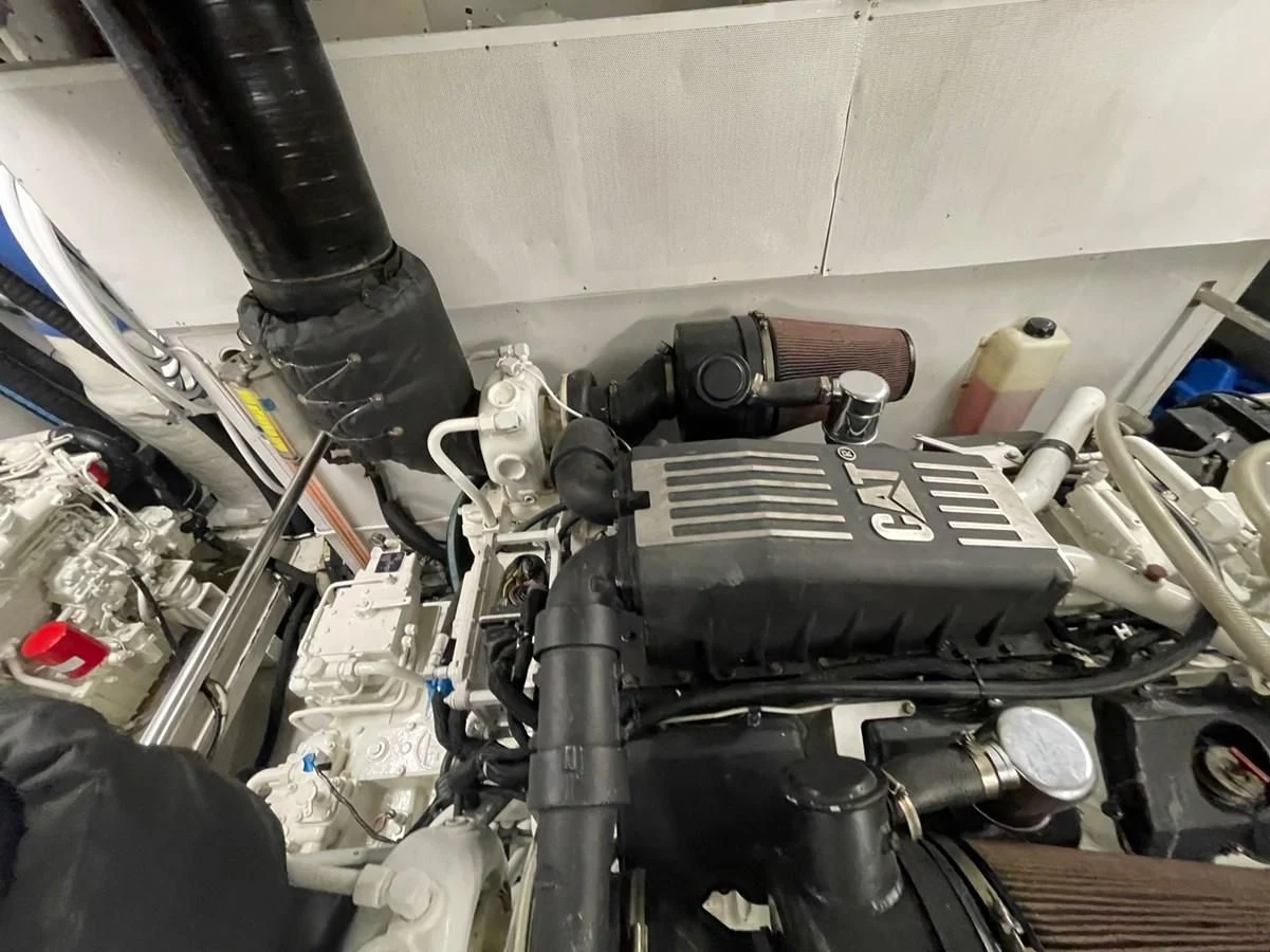 a close-up of a car engine aboard HAPPY Yacht for Sale