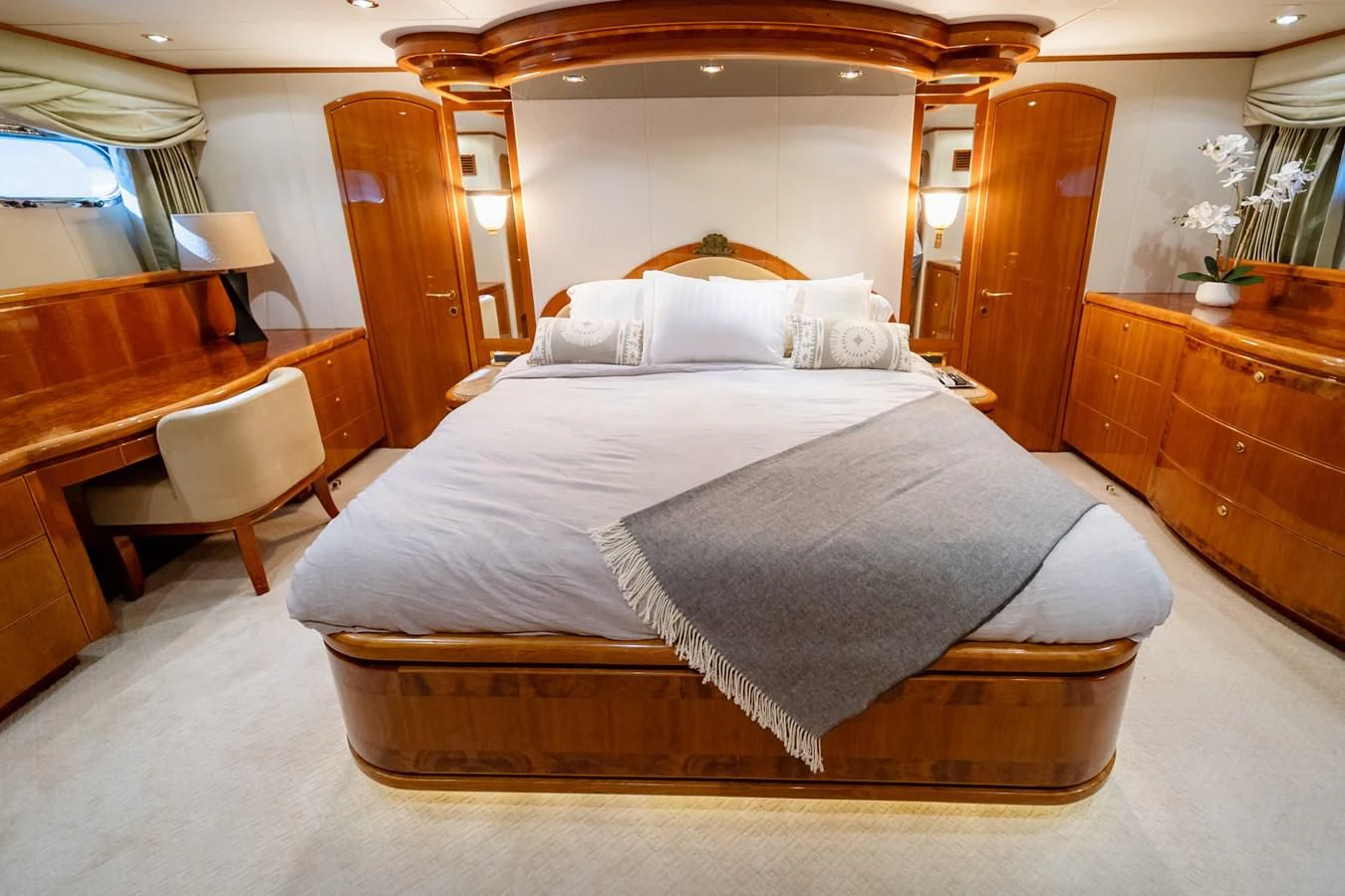 a bed with a white sheet aboard HAPPY Yacht for Sale
