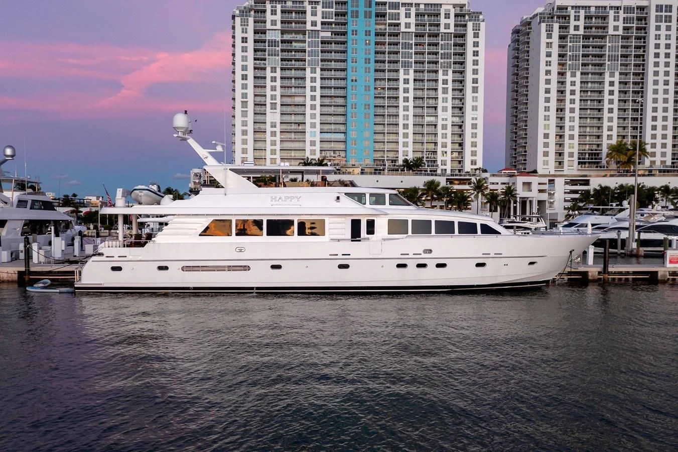 a white yacht in the water aboard HAPPY Yacht for Sale