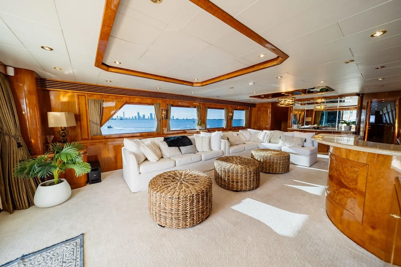a living room with a large open floor plan aboard HAPPY Yacht for Sale