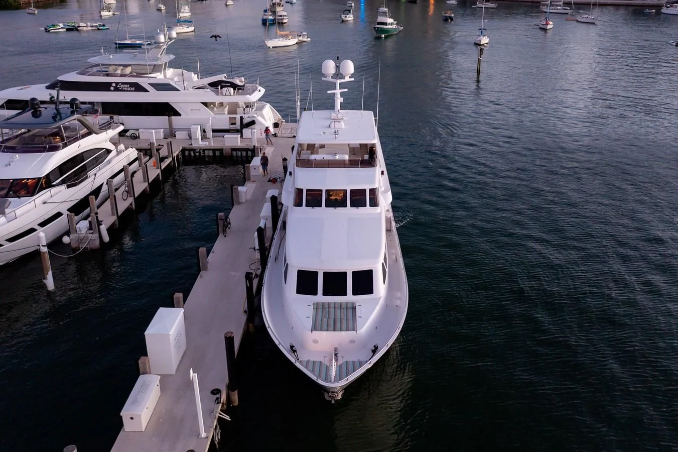 a group of boats in a harbor aboard HAPPY Yacht for Sale