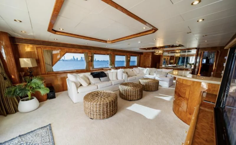 a living room with a large open floor plan aboard HAPPY Yacht for Sale