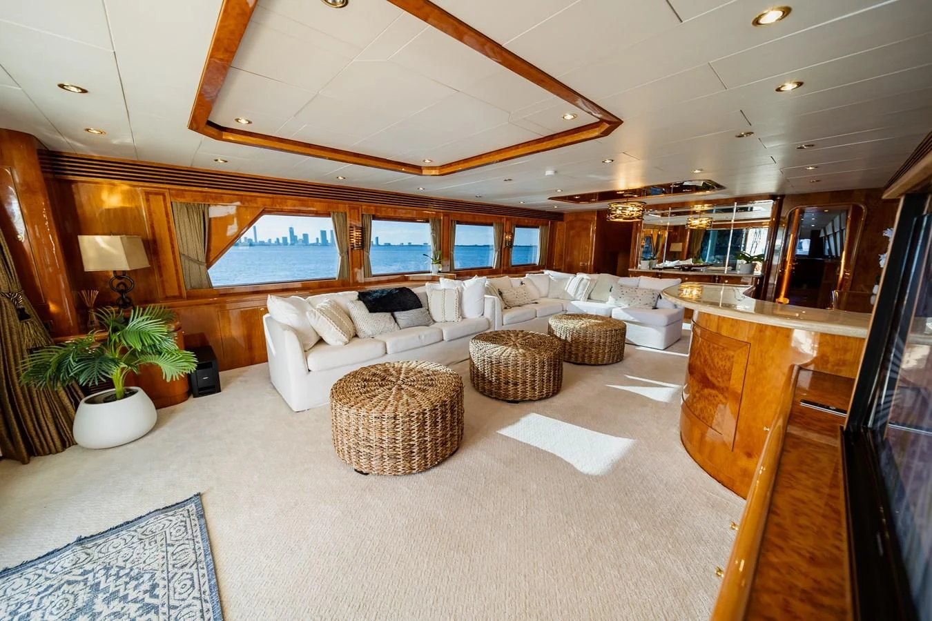 a large living room with a large open floor plan aboard HAPPY Yacht for Sale