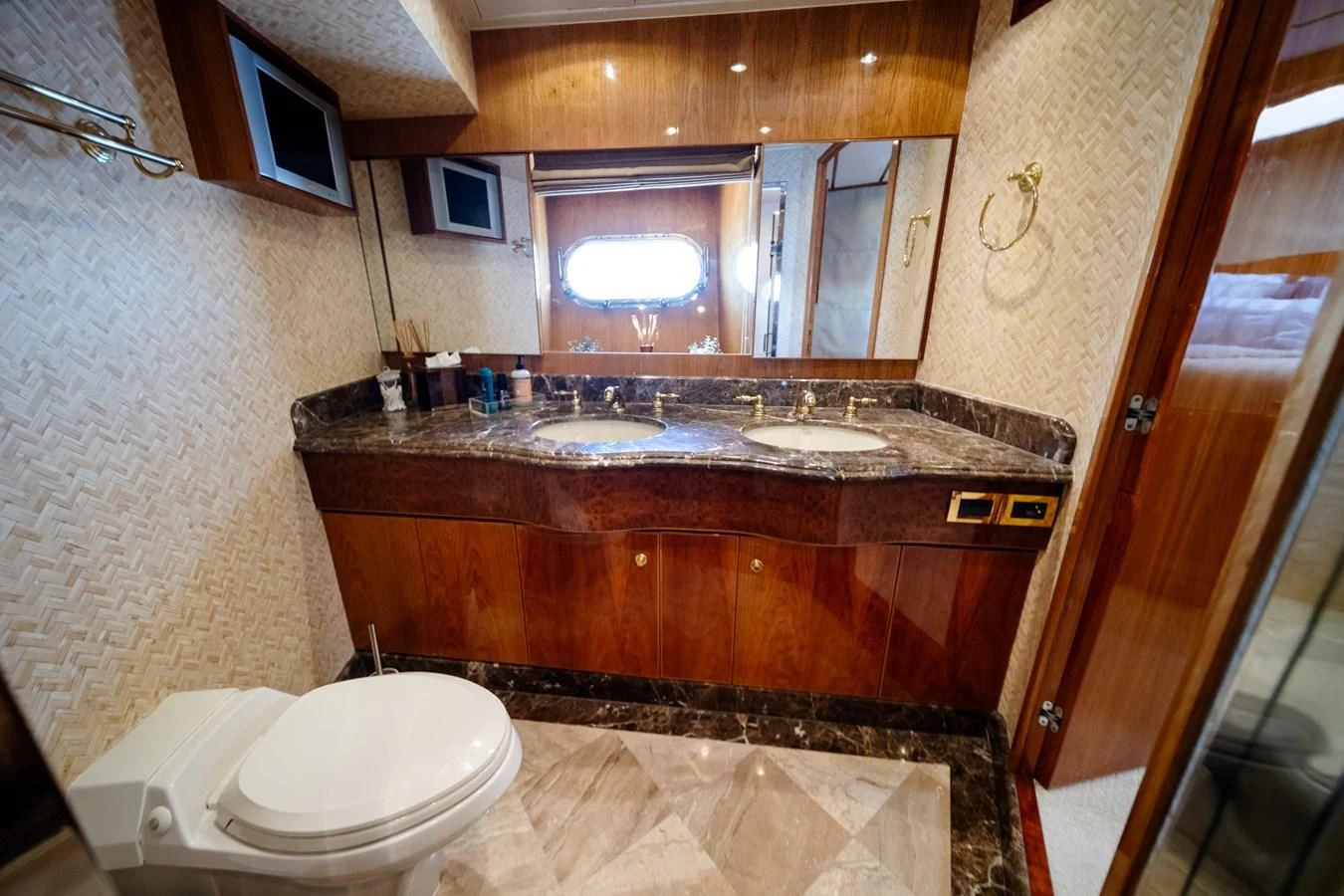 a bathroom with a countertop sink aboard HAPPY Yacht for Sale