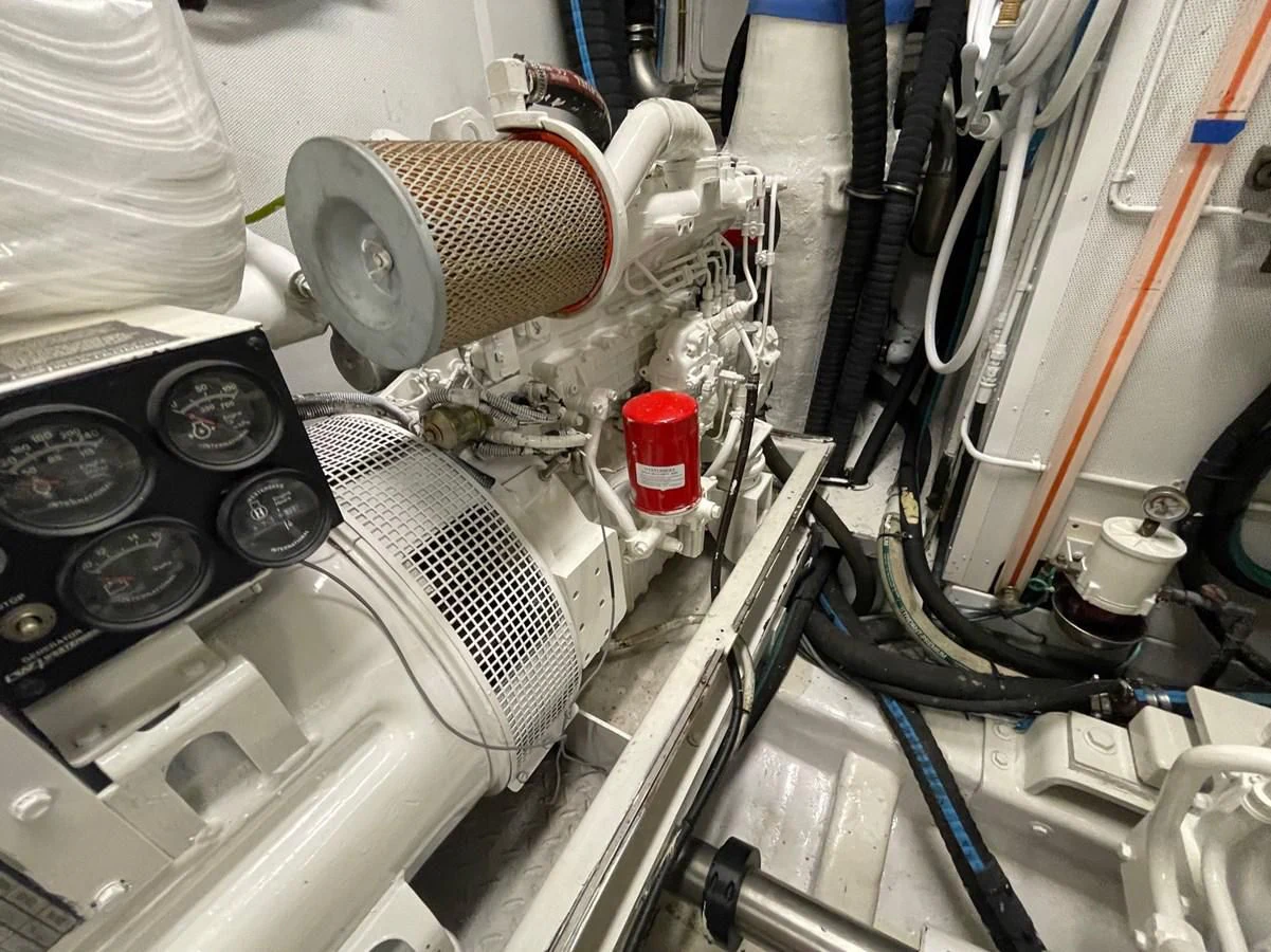 close-up of a car engine aboard HAPPY Yacht for Sale