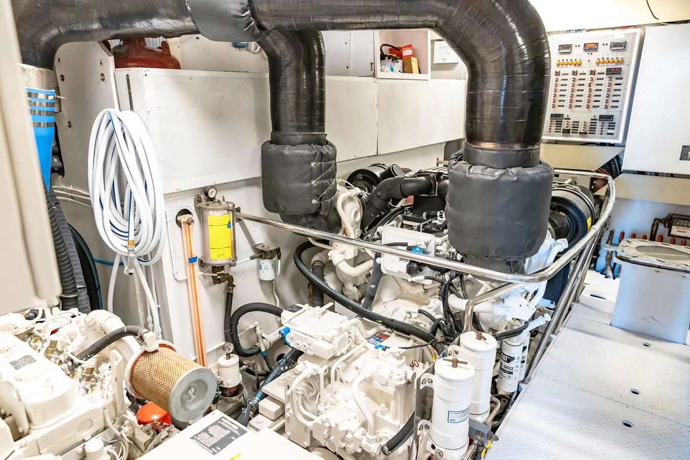 a machine with a large metal cylinder aboard HAPPY Yacht for Sale