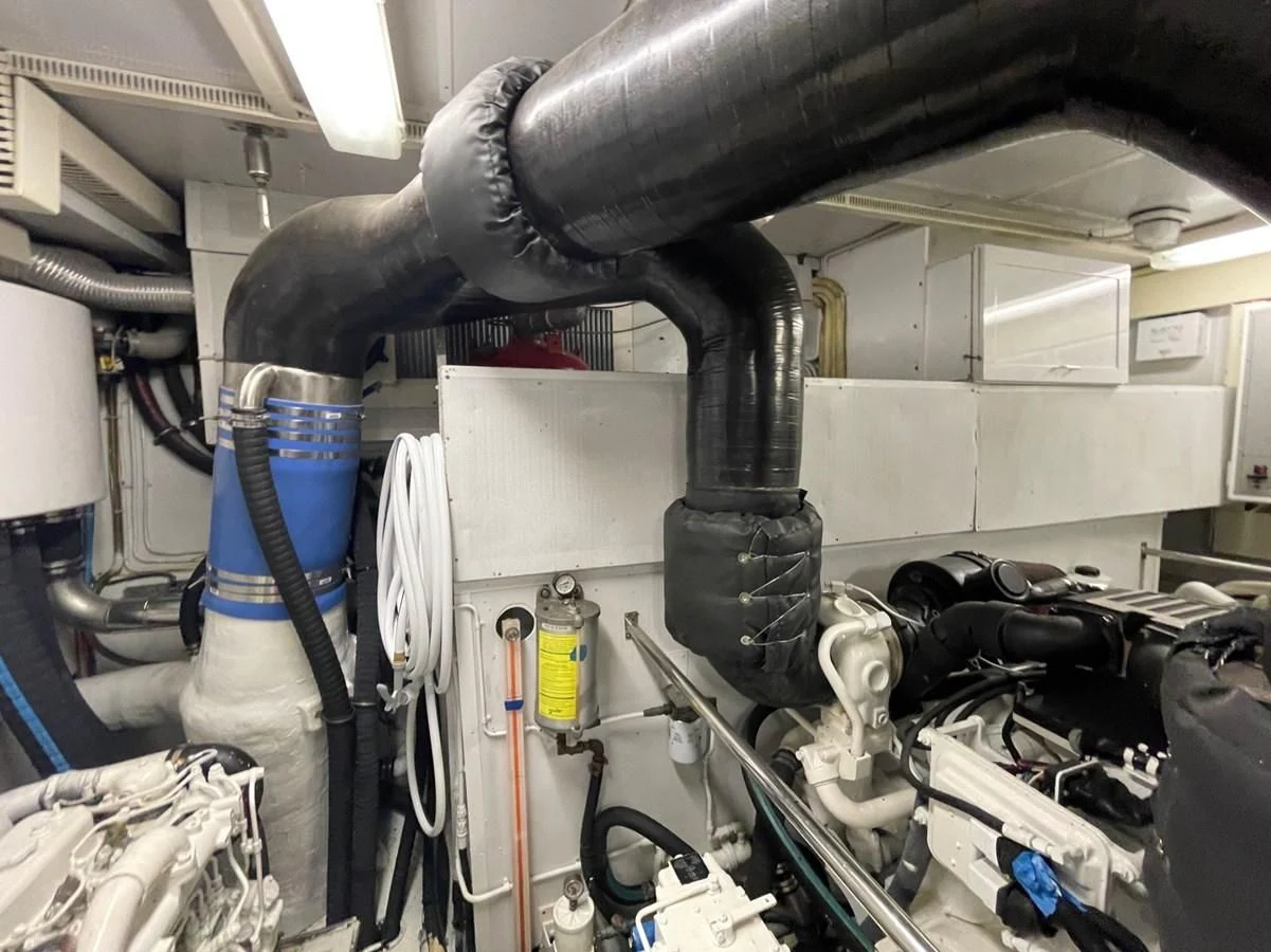 a machine with a large metal cylinder aboard HAPPY Yacht for Sale