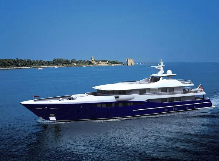 a large blue and white boat on water aboard DENIKI Yacht for Sale