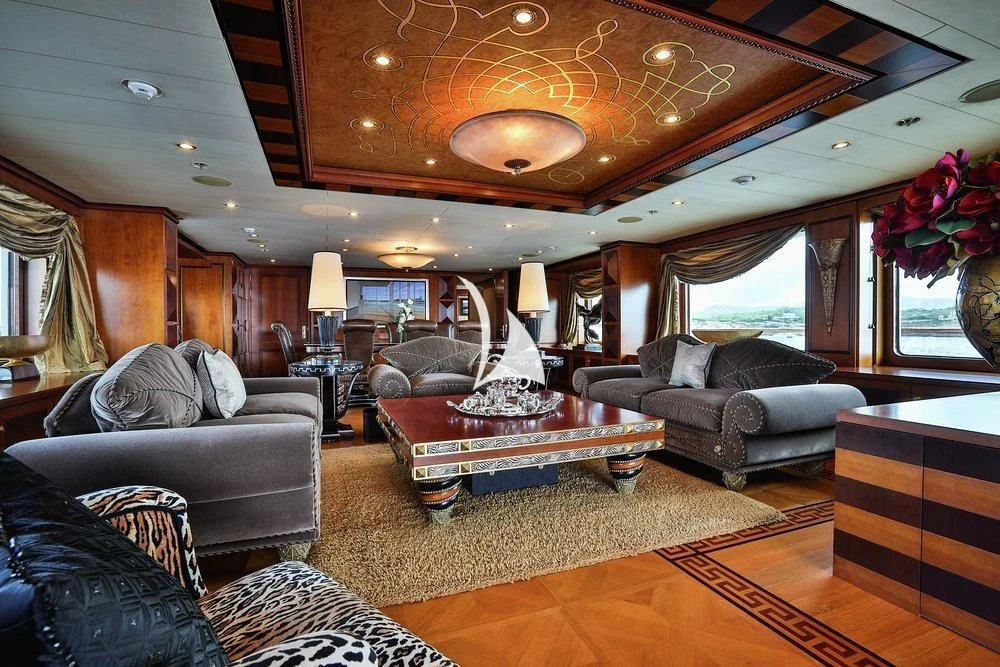 a living room with a large ceiling aboard DENIKI Yacht for Sale