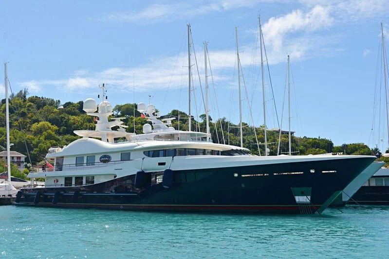 a large boat in the water aboard DENIKI Yacht for Sale