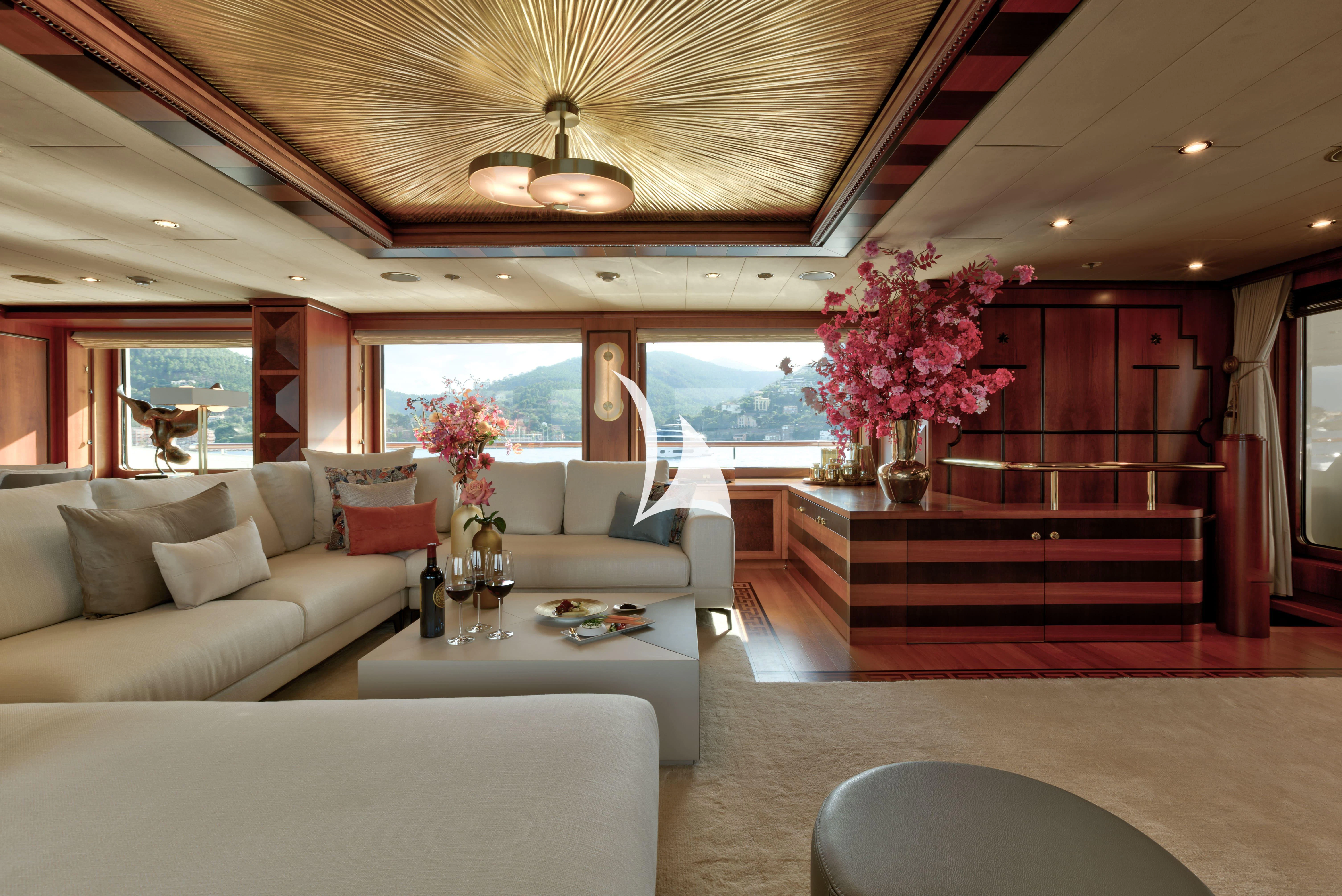 a living room with a large window aboard DENIKI Yacht for Sale
