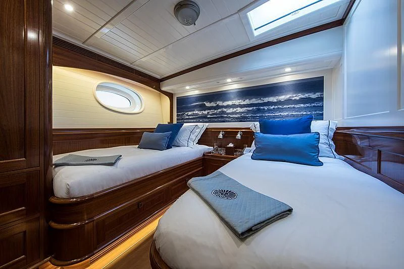 a room with two beds aboard VIJONARA Yacht for Sale