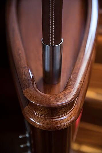 a guitar leaning against a wall aboard VIJONARA Yacht for Sale