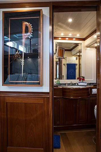 a bathroom with a large mirror aboard VIJONARA Yacht for Sale