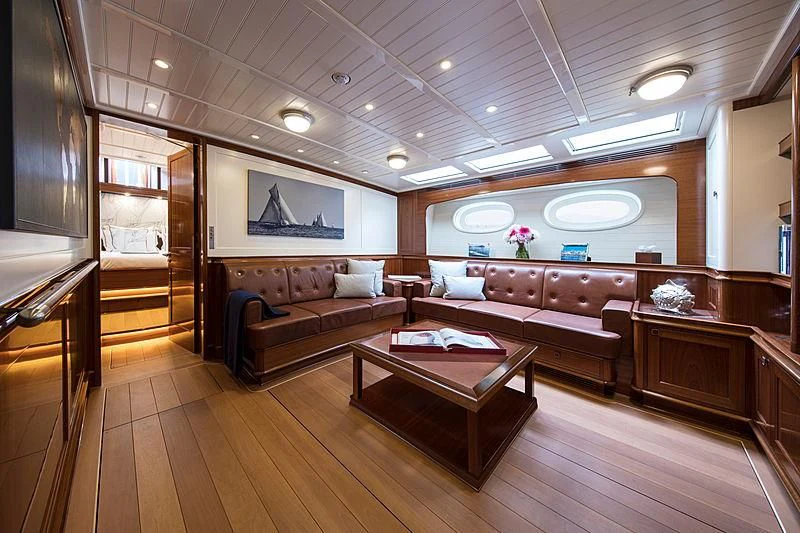 a living room with a wood floor aboard VIJONARA Yacht for Sale