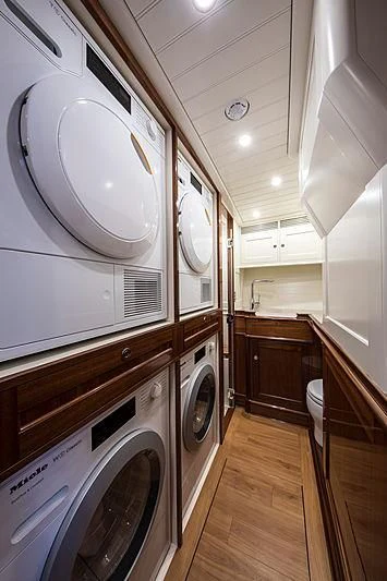 a laundry room with a washing machine aboard VIJONARA Yacht for Sale
