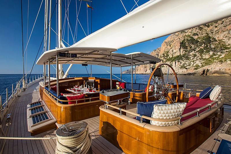 a boat docked at a pier aboard VIJONARA Yacht for Sale