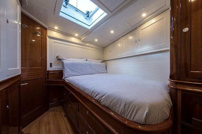 a bed in a room aboard VIJONARA Yacht for Sale