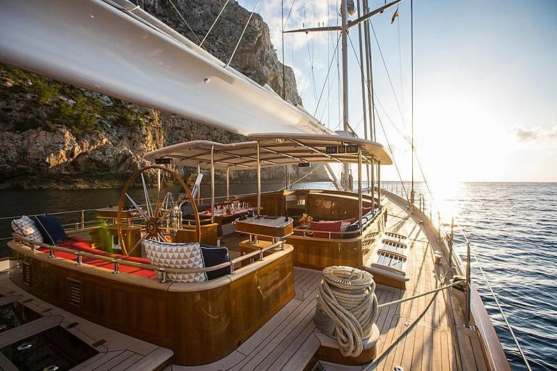 a boat docked at a pier aboard VIJONARA Yacht for Sale