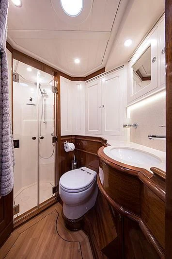 a bathroom with a toilet and sink aboard VIJONARA Yacht for Sale