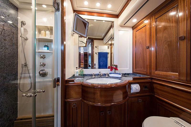 a bathroom with a shower unit and sink aboard VIJONARA Yacht for Sale