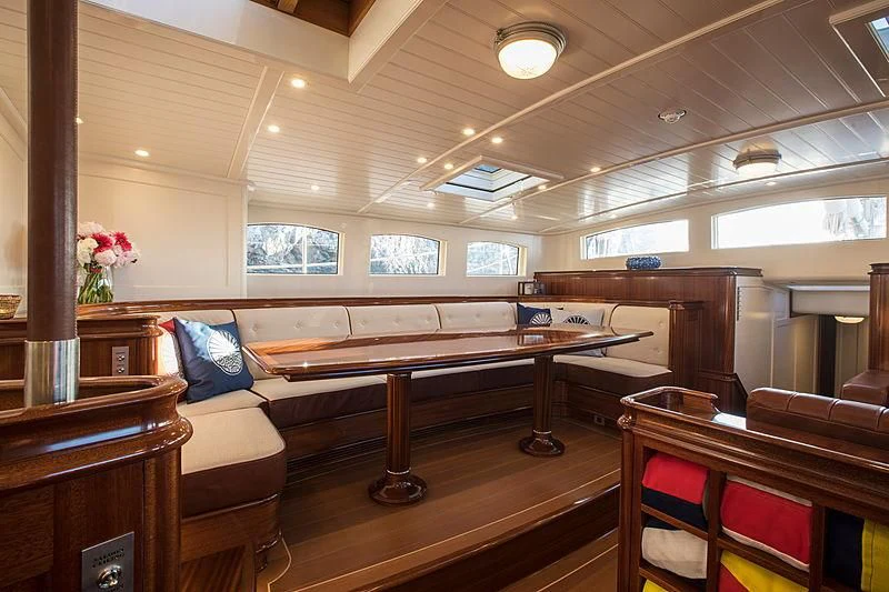 a room with a piano and a piano aboard VIJONARA Yacht for Sale