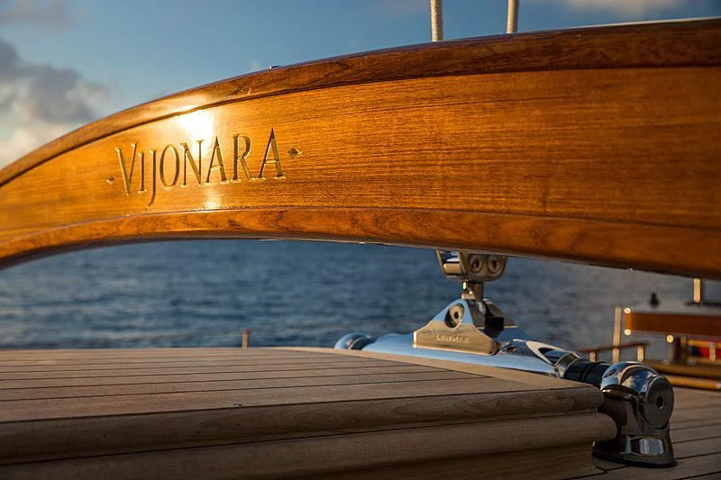 a wooden boat on the water aboard VIJONARA Yacht for Sale