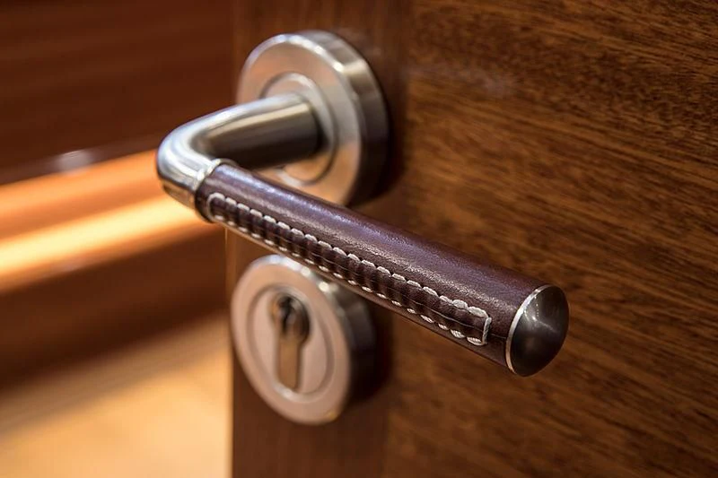 a close-up of a door handle aboard VIJONARA Yacht for Sale