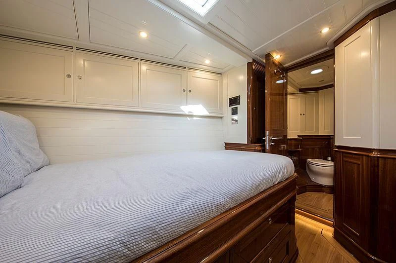 a large bedroom with a large bed aboard VIJONARA Yacht for Sale