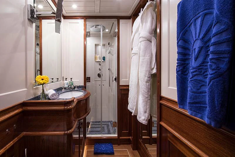 a bathroom with a sink and a mirror aboard VIJONARA Yacht for Sale