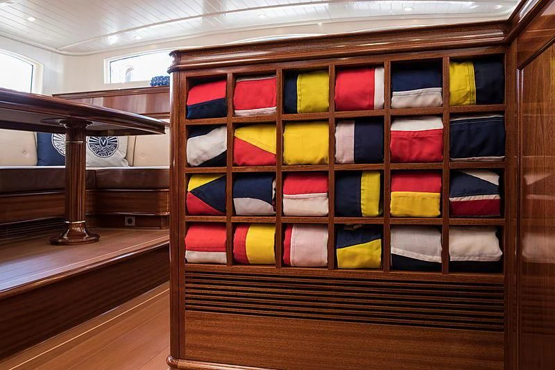a display of different colored flags aboard VIJONARA Yacht for Sale