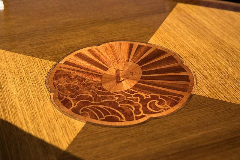 a wooden object on a table aboard VIJONARA Yacht for Sale